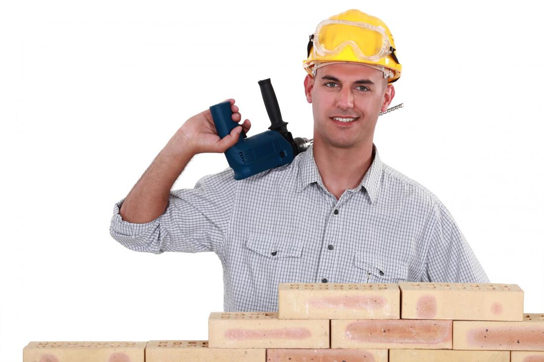 handyman holding a drill